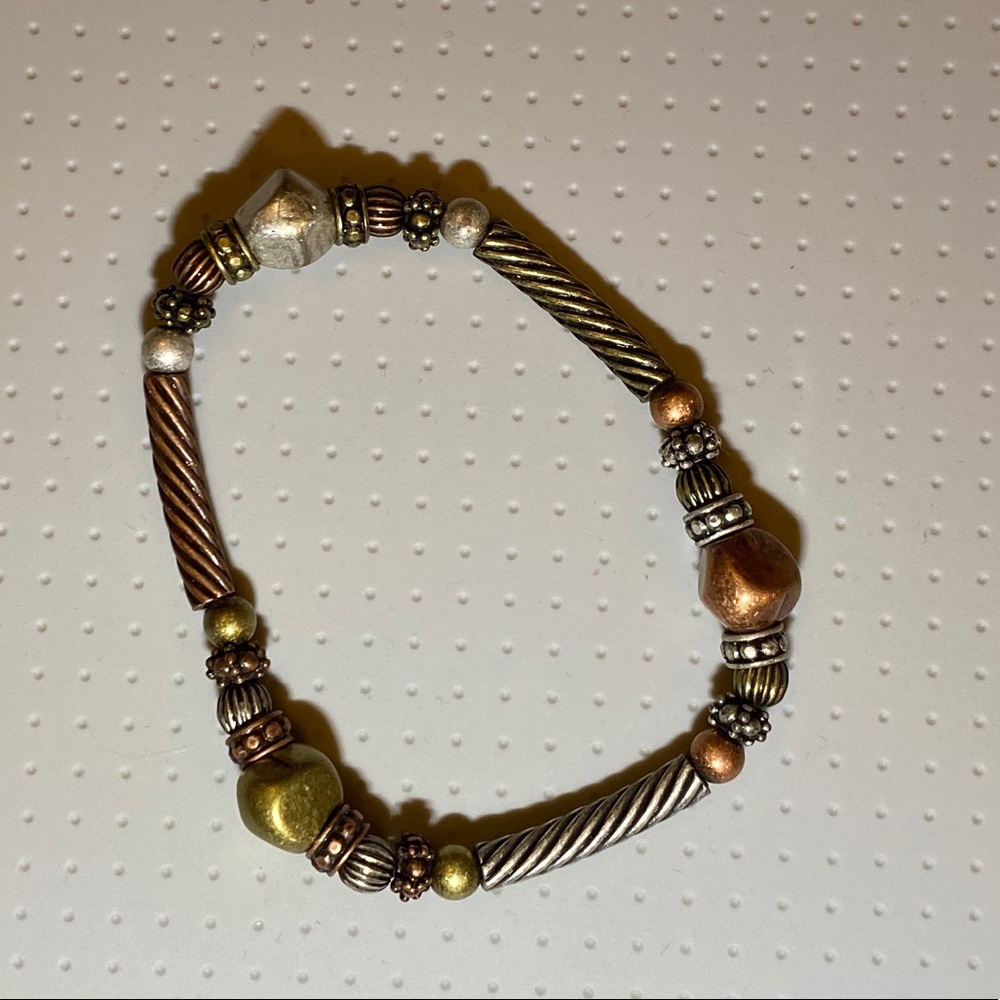 Gold and silver bracelet with bronze.